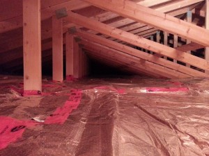 Attic insulated with arctic clad reflective technology